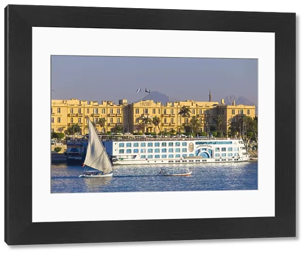 Egypt, Luxor, View of Nile cruise boats infront of The Winter Palace Hotel