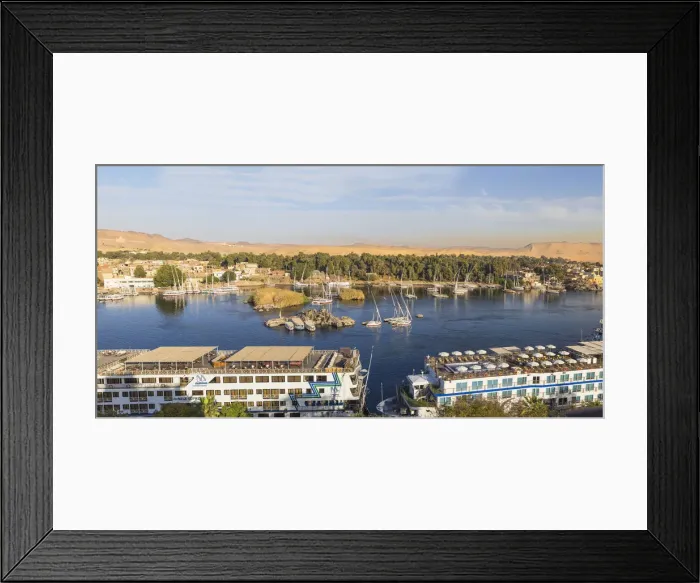 Framed Print : Egypt, Upper Egypt, Aswan, river cruise ships on River Nile Framed Print : Egypt, Upper Egypt, Aswan, river cruise ships on River Nile