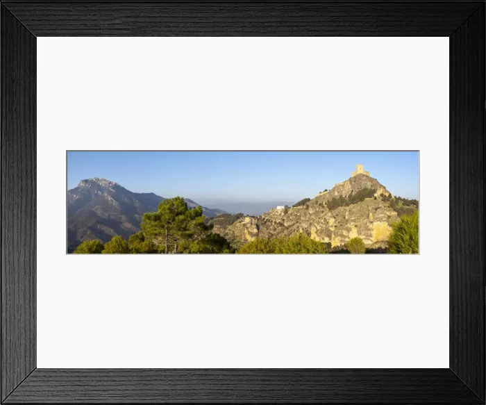 Framed Print : The Mudejar Castle overlooking the mountain village of Segura de la Sierra, Jaen Province Framed Print : The Mudejar Castle overlooking the mountain village of Segura de la Sierra, Jaen Province