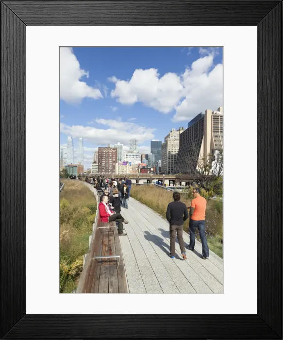 Framed Print : People walking on the High Line, a 1-mile New York City park on a section of former Framed Print : People walking on the High Line, a 1-mile New York City park on a section of former
