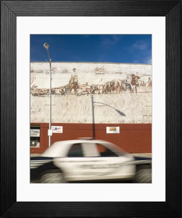 Framed Print : USA, Kansas, Route 66, Baxter Springs, John Gibbins Mural (1991) and police car Framed Print : USA, Kansas, Route 66, Baxter Springs, John Gibbins Mural (1991) and police car
