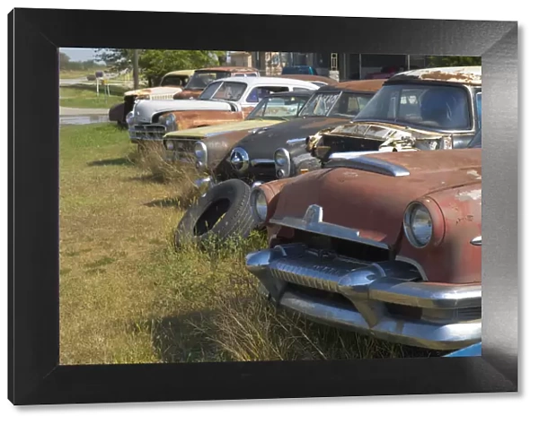 USA, Oklahoma, Route 66, White Oak, Old cars in wreckers yard beside Route 66