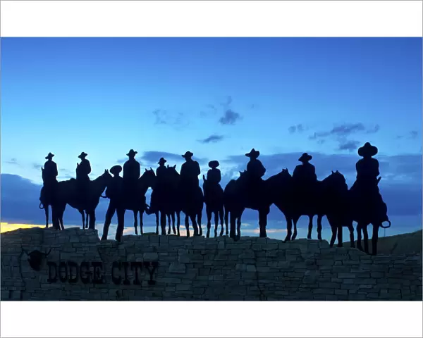 USA, Kansas, Dodge City, Silhouetted Ghost Riders Welcoming Sign, Metal Art Work