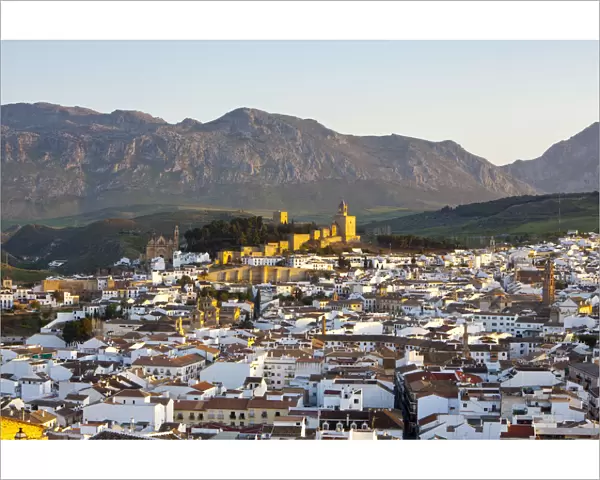 Moorish Alcazaba (castle) & city overview at sunset, Antequera, Malaga Province, Andalusia