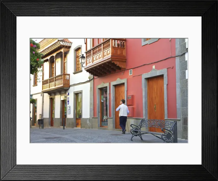 Framed Print : Old Houses With The Traditionally Carved Balconies On Calle Real de la Plaza Framed Print : Old Houses With The Traditionally Carved Balconies On Calle Real de la Plaza