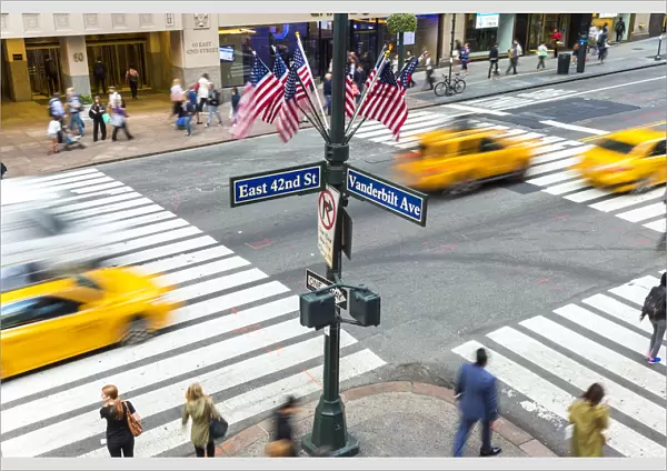 Busy pedestrian crossing, Central Manhattan, New York, USA