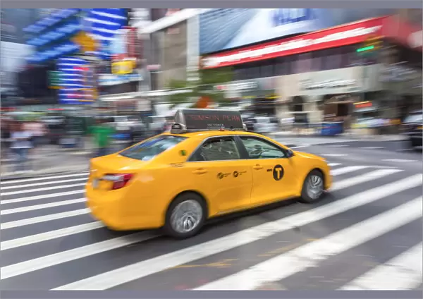 Yellow taxi, central Manhattan, New York, USA