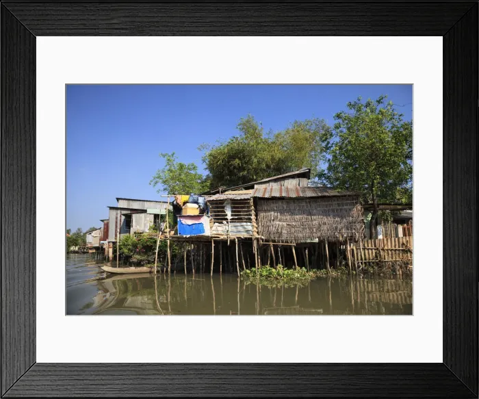 Framed Print : Vietnam, Mekong Delta, Can Tho, small village on the canals around town