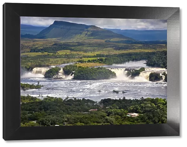 Venezuela, Guayana, Canaima National Park, Ariel view of Cainaima Lagoon and Hacha falls