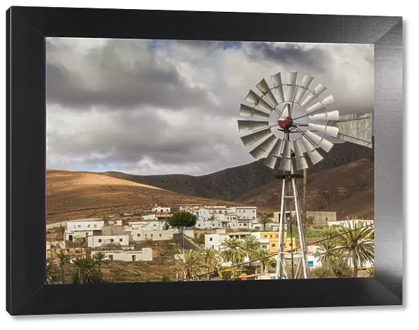 Spain, Canary Islands, Fuerteventura Island, Toto, desert village view with windmill