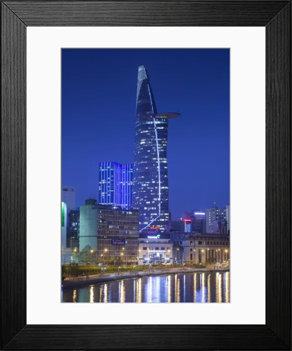 Framed Print : Vietnam, Ho Chi Minh City, city view with Bitexco Tower along the Ben Nghe Canal, dusk Framed Print : Vietnam, Ho Chi Minh City, city view with Bitexco Tower along the Ben Nghe Canal, dusk