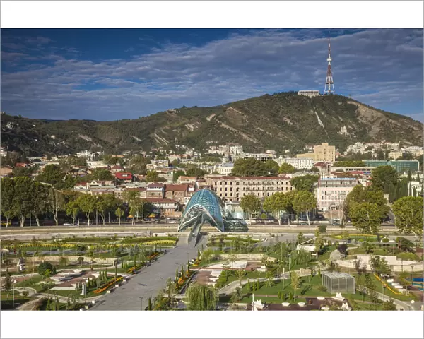 Georgia, Tbilisi, View of Peace bridge and Rike Park