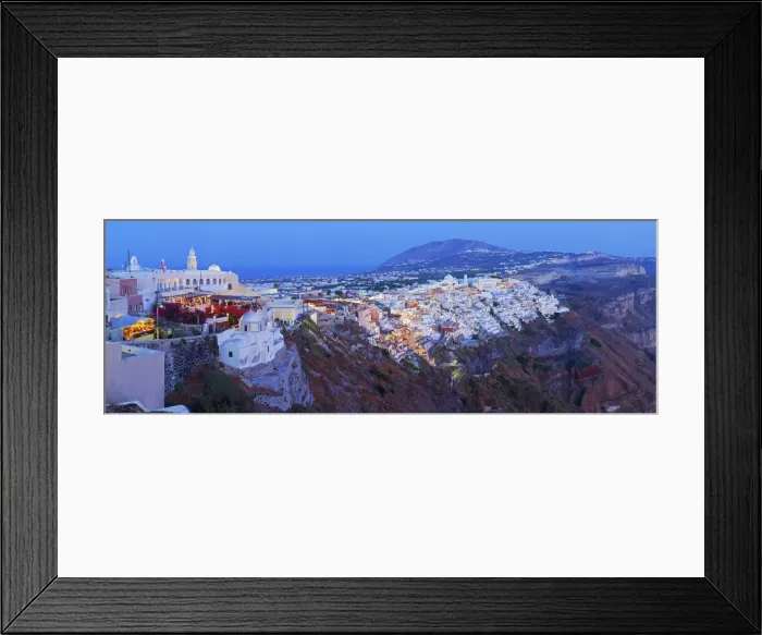 Framed Print : Elevated view over the Volcanic landscape and main town of Fira, Santorini (Thira) Framed Print : Elevated view over the Volcanic landscape and main town of Fira, Santorini (Thira)