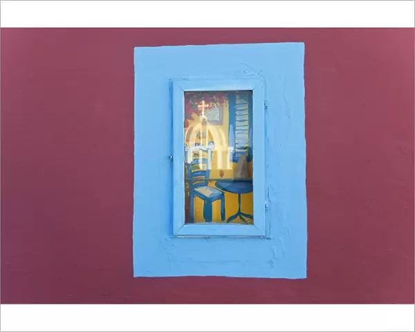 Reflection of church in picture window, Santorini (Thira), Cyclades, Greece