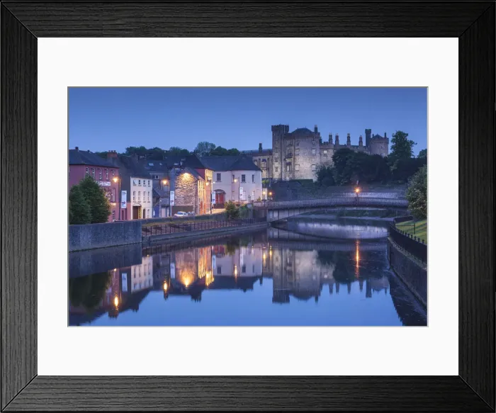 Framed Print : Ireland, County Kilkenny, Kilkenny City, pubs along River Nore and Kilkenny Castle, dusk Framed Print : Ireland, County Kilkenny, Kilkenny City, pubs along River Nore and Kilkenny Castle, dusk