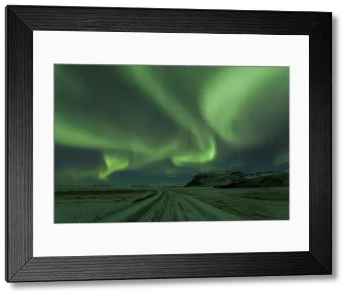 Framed Print : Northern Lights, Aurora Borealis, Winter road with snow, Iceland Framed Print : Northern Lights, Aurora Borealis, Winter road with snow, Iceland