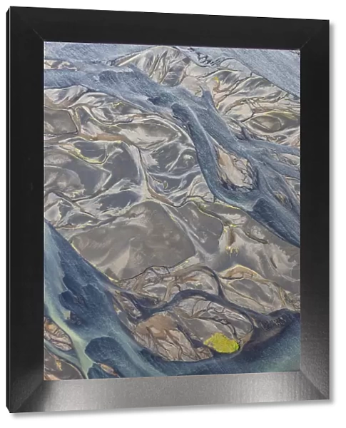 Aerial of river estuary water coloured by glacial melt, Iceland