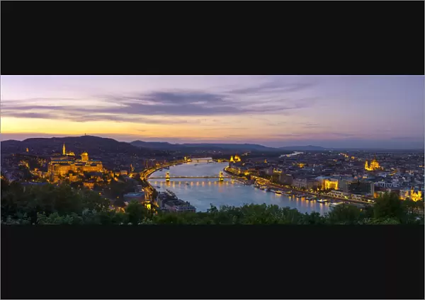 Elevated view over Budapest & the River Danube illuminated at sunset, Budapest