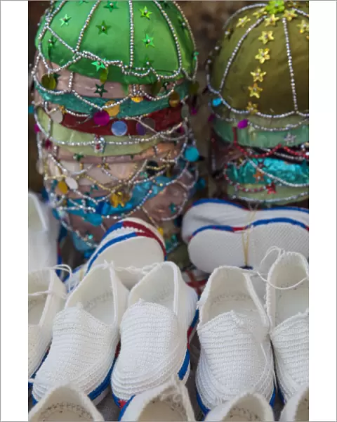 Iraq, Kurdistan, Erbil, Hats and Shoes at Qaysari Bazaar