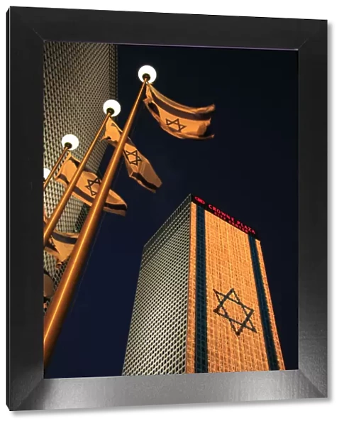 Israel, Tel Aviv, an illuminated Israeli flag at Azrieli Center on Independence day