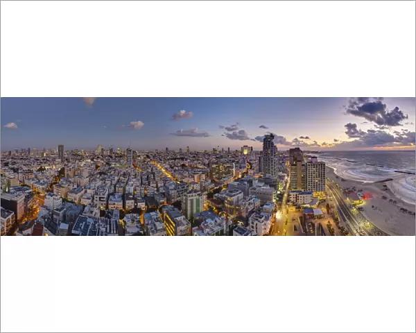 Israel, Tel Aviv, elevated dusk view of beachfront hotel
