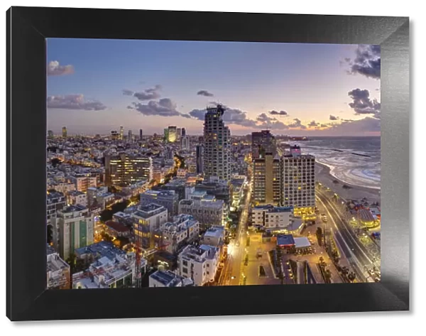 Israel, Tel Aviv, elevated dusk view of beachfront hotel