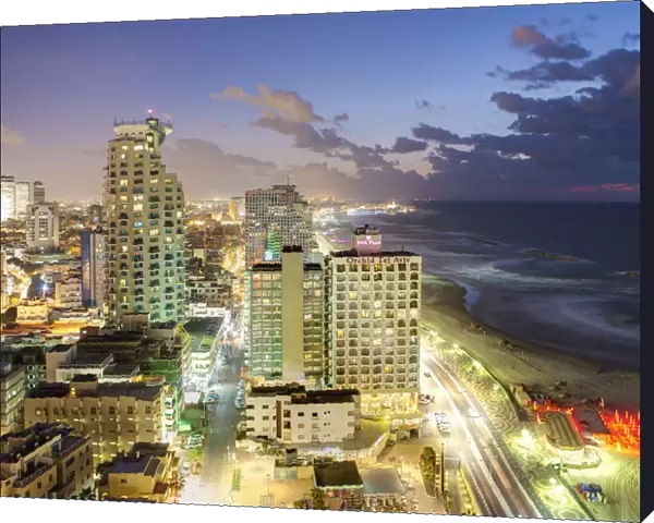 Israel, Tel Aviv, elevated dusk view of the downtown Tel Aviv commercial and residential