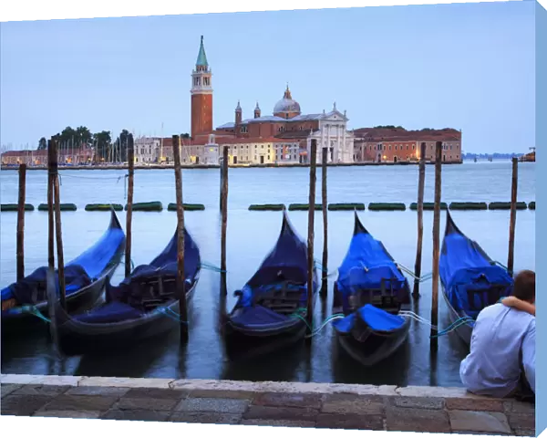Italy, Veneto, Venice, Sestier of San Marco, Moored gondolas with San Giorgio Maggiore