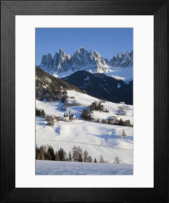 Framed Print : Winter landscape of St. Magdalena village and church, Geisler Spitzen (3060m), Val