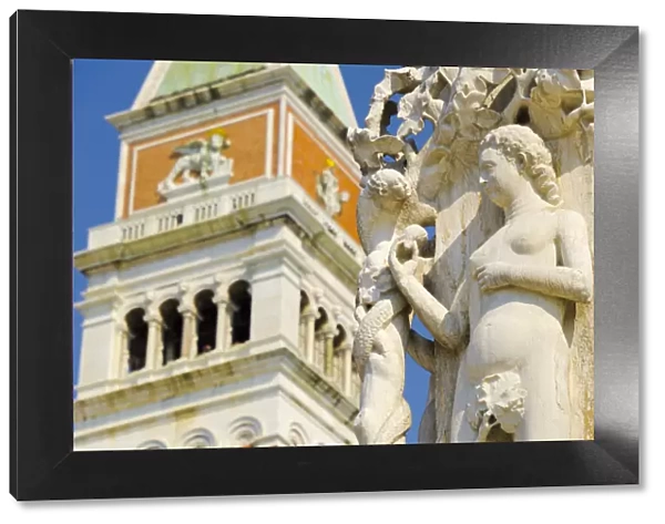 Italy, Veneto, Venice, The Campanile (Bell Tower) and carving on corner of Doges
