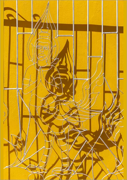 Laos, Vientiane, Wat Si Muang, window gates with Buddha figure
