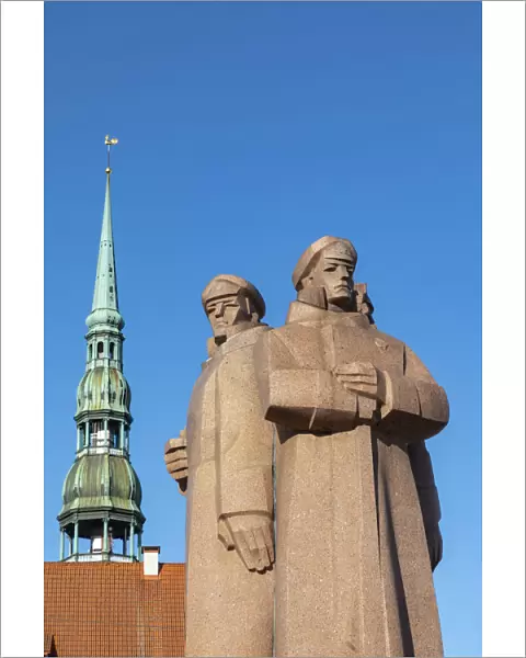 The Latvian Riflemen Monument and St. Peters Church, Old Town, Riga, Latvia