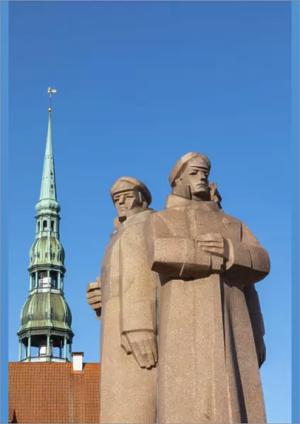 The Latvian Riflemen Monument and St. Peters Church, Old Town, Riga, Latvia