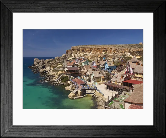 Framed Print : Malta, Northwest Malta, Anchor Bay, Sweethaven, Popeye Village, family fun park, formerly Framed Print : Malta, Northwest Malta, Anchor Bay, Sweethaven, Popeye Village, family fun park, formerly