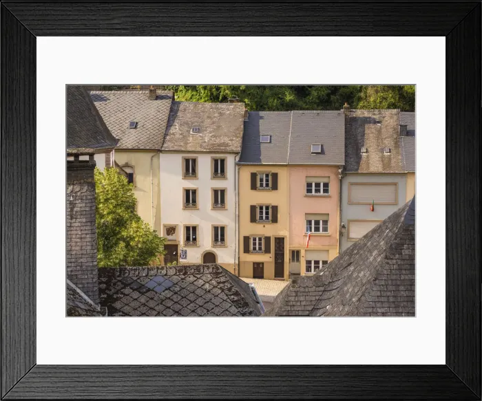 Framed Print : Luxembourg, Vianden, Pastel-coloured houses and shops on Rue Grande Framed Print : Luxembourg, Vianden, Pastel-coloured houses and shops on Rue Grande