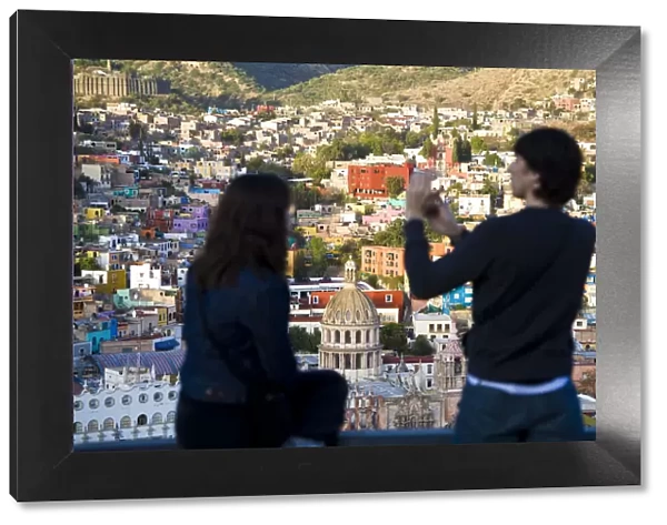 Couple taking picture over Guanajuato, Guanajuato state, Mexico