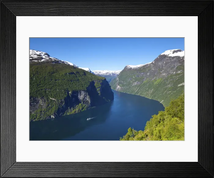 Framed Print : A car ferry navigates through the dramatic Geiranger Fjord, Geiranger, More og Romsdal Framed Print : A car ferry navigates through the dramatic Geiranger Fjord, Geiranger, More og Romsdal