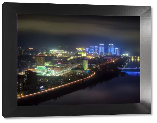 Pyongyang, new modern buildings in the centre of Pyongyang colourfully illuminated