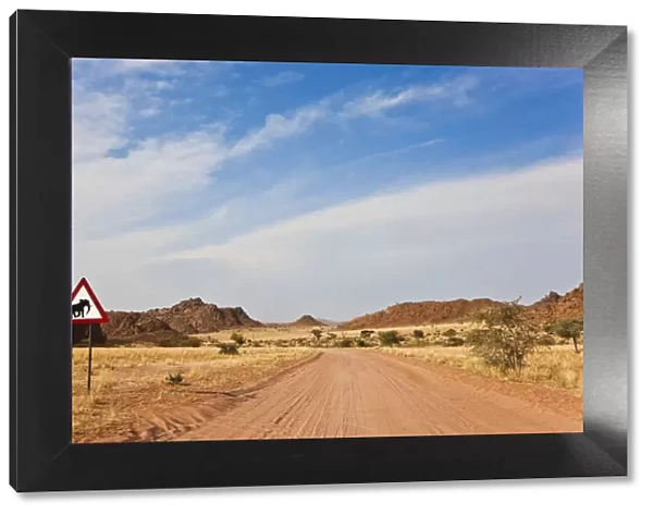 Elephant road sign & road, Damaraland, Namibia