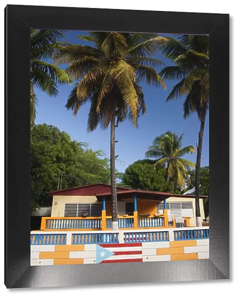 Puerto Rico, South Coast, Guanica, house with Puerto Rican flag mural