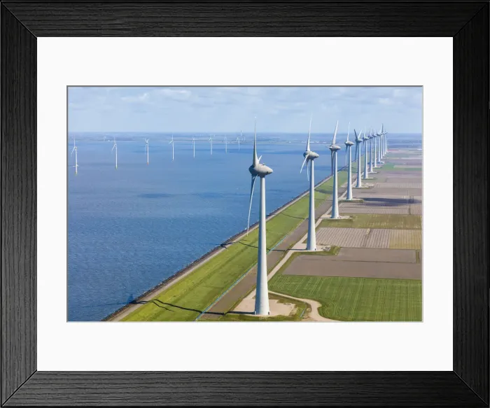 Framed Print : Aerial view of wind turbines on land and at sea, North Holland, Netherlands Framed Print : Aerial view of wind turbines on land and at sea, North Holland, Netherlands