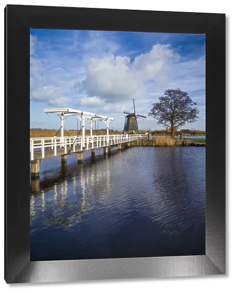 Netherlands, Kinderdijk, Traditional Dutch windmills and bridge