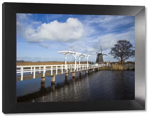 Netherlands, Kinderdijk, Traditional Dutch windmills and bridge