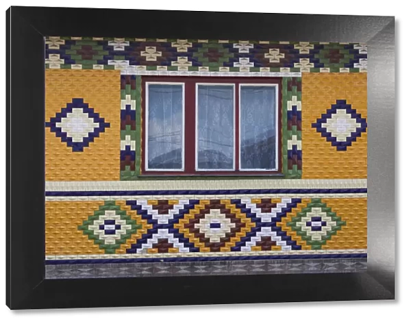 Romania, Maramures Region, Rona de Jos, ornate tiled house