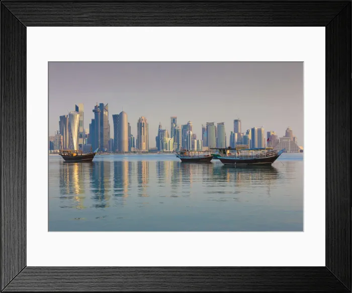 Framed Print : Qatar, Doha, Dhows on Doha Bay with West Bay skyscrapers, dawn