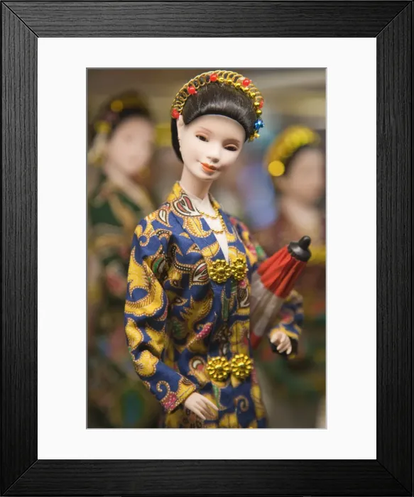Framed Print : Figurine of Asian woman in traditional dress, Singapore Framed Print : Figurine of Asian woman in traditional dress, Singapore