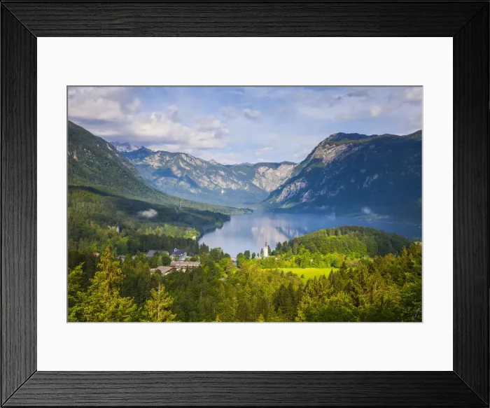 Framed Print : Elevated view over idyllic Lake Bohinj & The Church of St Framed Print : Elevated view over idyllic Lake Bohinj & The Church of St