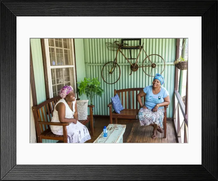 Framed Print : Two ladies on porch of historical building, Pilgrims Rest, gold mining village Framed Print : Two ladies on porch of historical building, Pilgrims Rest, gold mining village