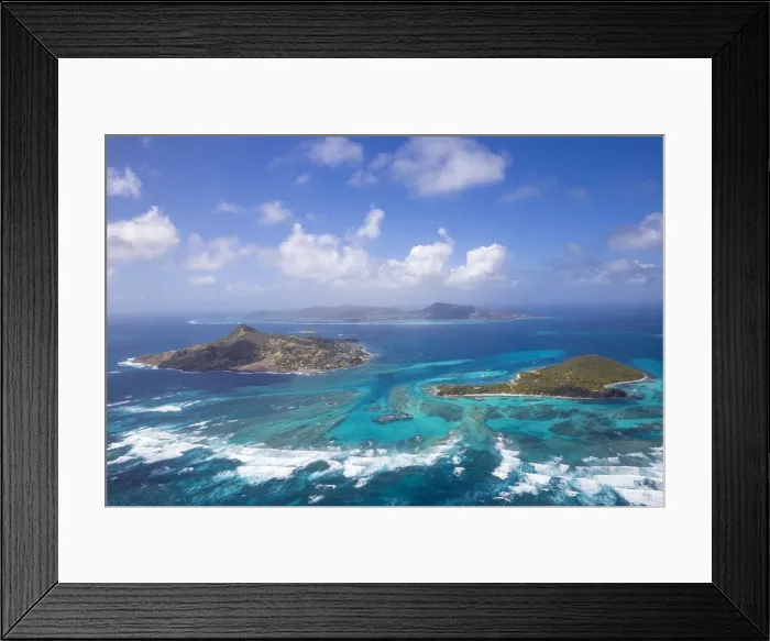 Framed Print : St Vincent and The Grenadines, Aerial view looking over Petit St Vincent, towards Framed Print : St Vincent and The Grenadines, Aerial view looking over Petit St Vincent, towards