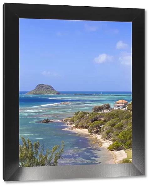 St Vincent and The Grenadines, View of beach on Union Island, with Frigate Island